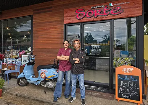 Founders Dhanat and Kasira at the Sorte Bophut entrance Dhanat and Kasira at the Bophut branch entrance